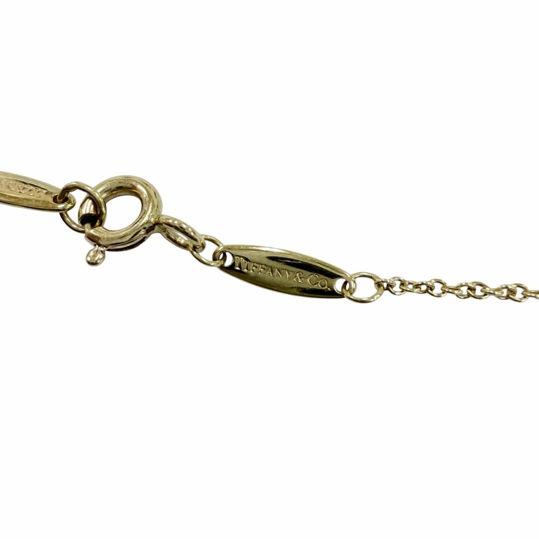Great TIFFANY&Co. Diamond by the Yard Single Diamond Pendant Yellow Gold