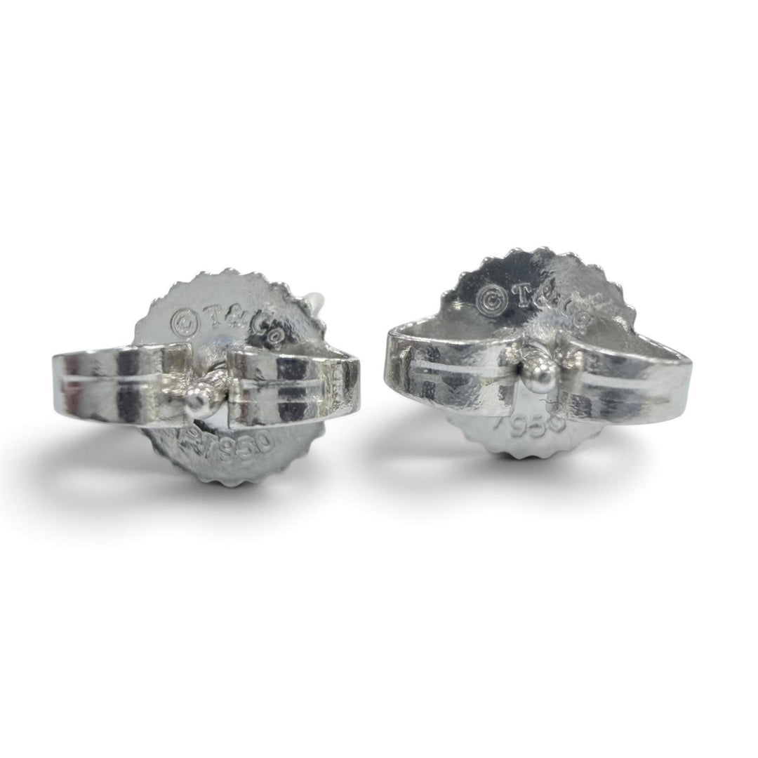 Excellent TIFFANY&Co. Pierce Stud Diamond Pierce purchased in May 2011. Platinum