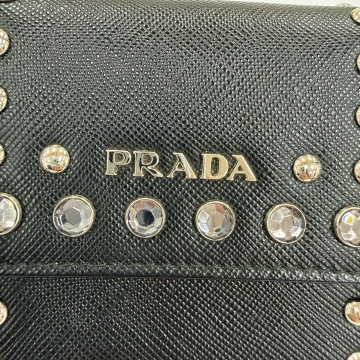 Great PRADA Card Case Leather pass case with strap, logo, jewels, and studs.