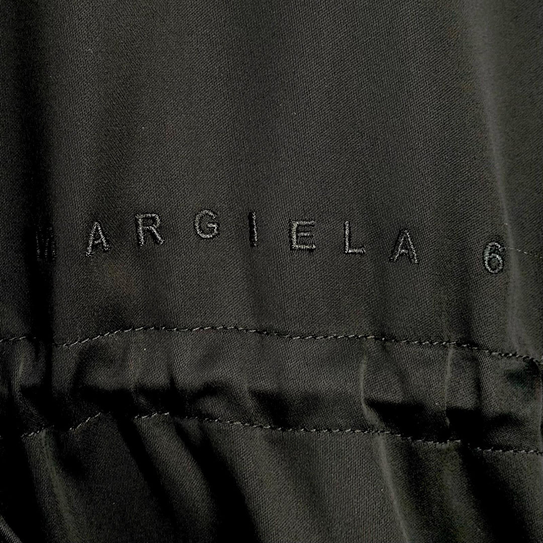 Pristine MM6 Maison Margiela one piece Logo acupuncture black 14 M60488