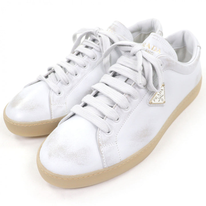 Pristine PRADA Low cut sneakers Triangle logo distressed finish white