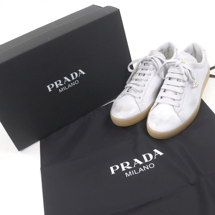 Pristine PRADA Low cut sneakers Triangle logo distressed finish white