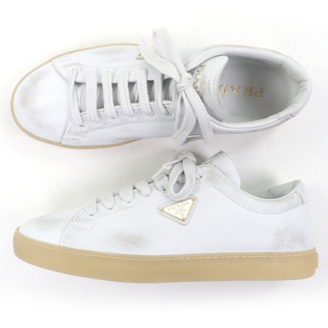Pristine PRADA Low cut sneakers Triangle logo distressed finish white