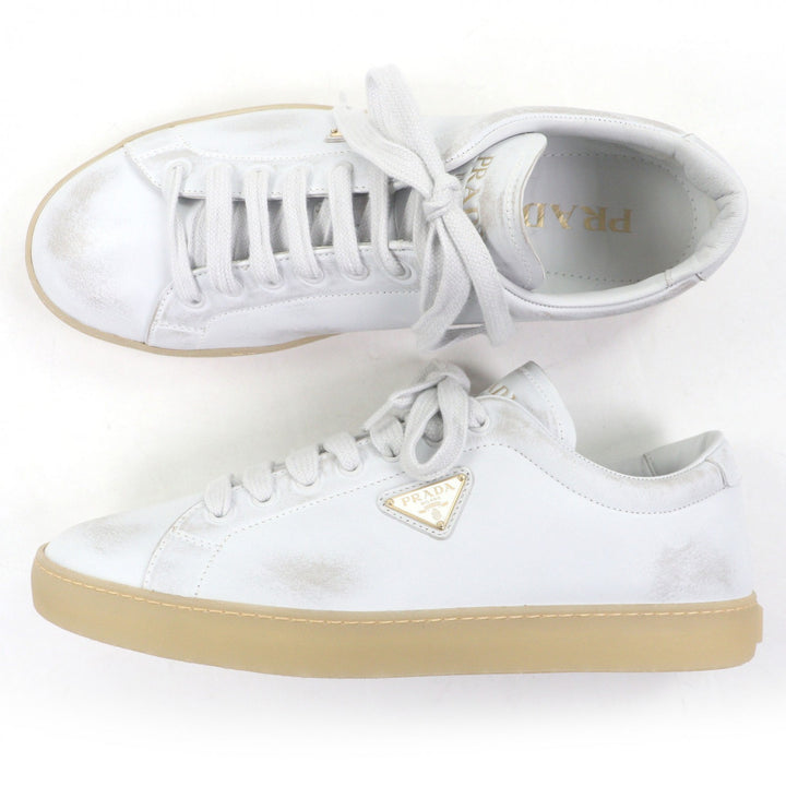 Pristine PRADA Low cut sneakers Triangle logo distressed finish white