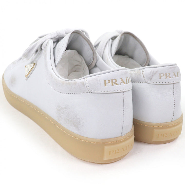 Pristine PRADA Low cut sneakers Triangle logo distressed finish white