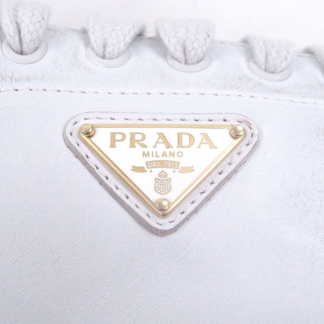 Pristine PRADA Low cut sneakers Triangle logo distressed finish white