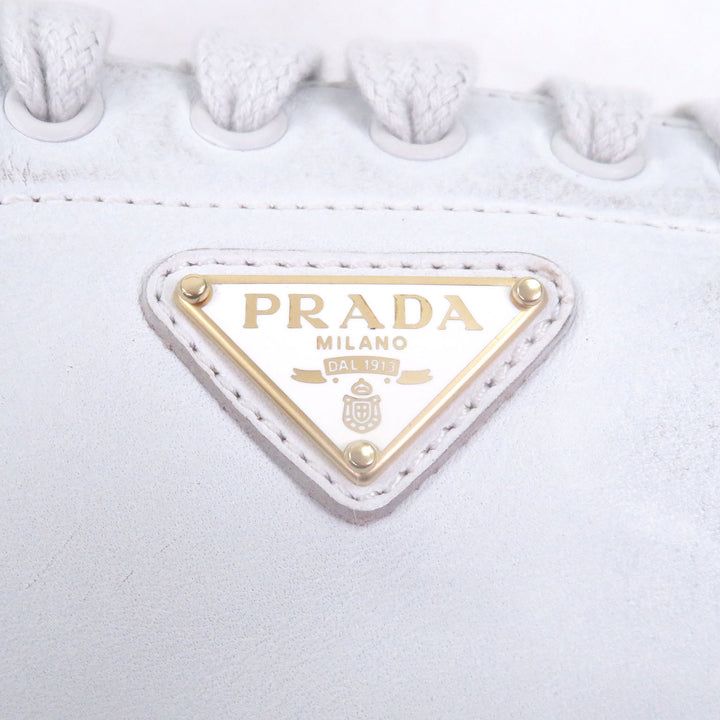 Pristine PRADA Low cut sneakers Triangle logo distressed finish white
