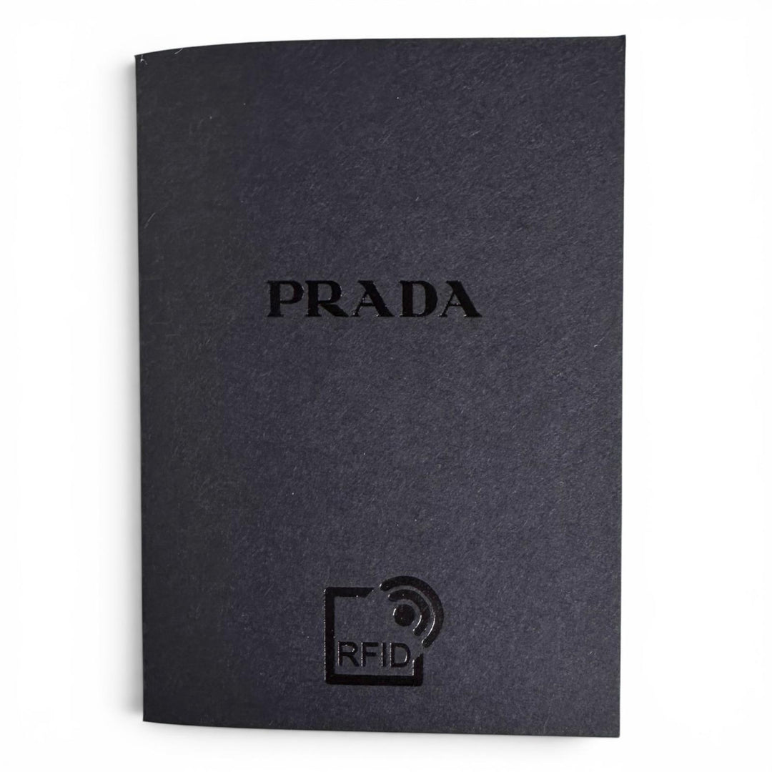 Excellent PRADA Coin case Vitello Daino Triangle Logo Round white leather 1MM006
