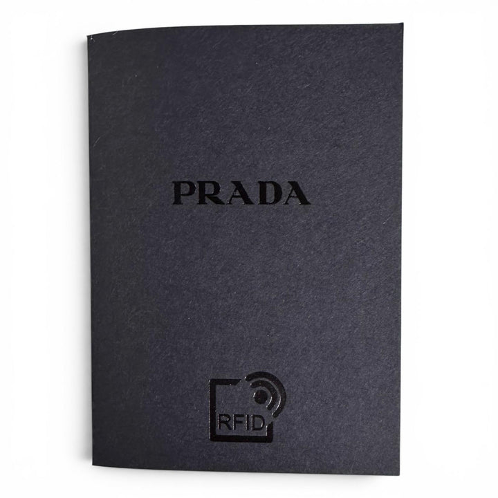 Excellent PRADA Coin case Vitello Daino Triangle Logo Round white leather 1MM006