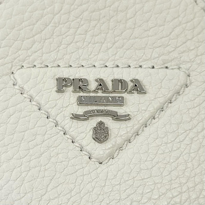 Excellent PRADA Coin case Vitello Daino Triangle Logo Round white leather 1MM006