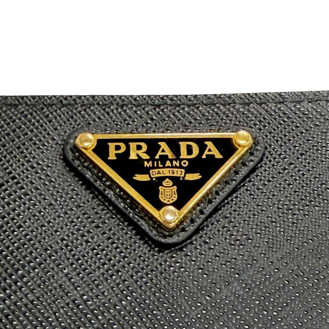 Great PRADA Triangle Logo Zip Around Long Wallet black Safiano leather 1ML506