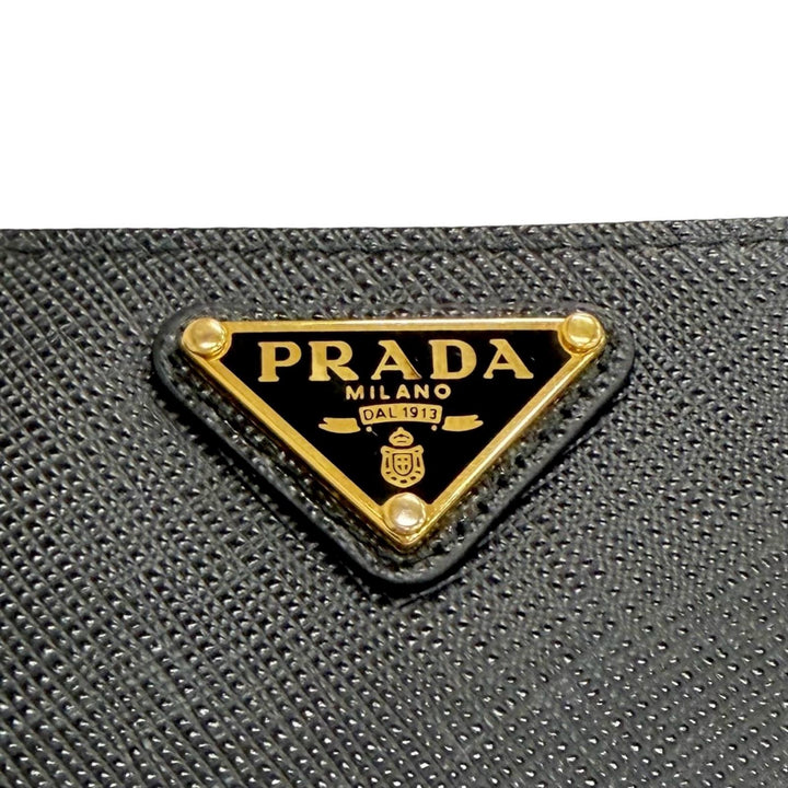 Great PRADA Triangle Logo Zip Around Long Wallet black Safiano leather 1ML506