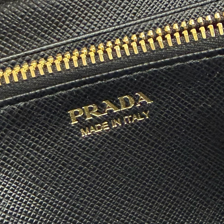 Great PRADA Triangle Logo Zip Around Long Wallet black Safiano leather 1ML506