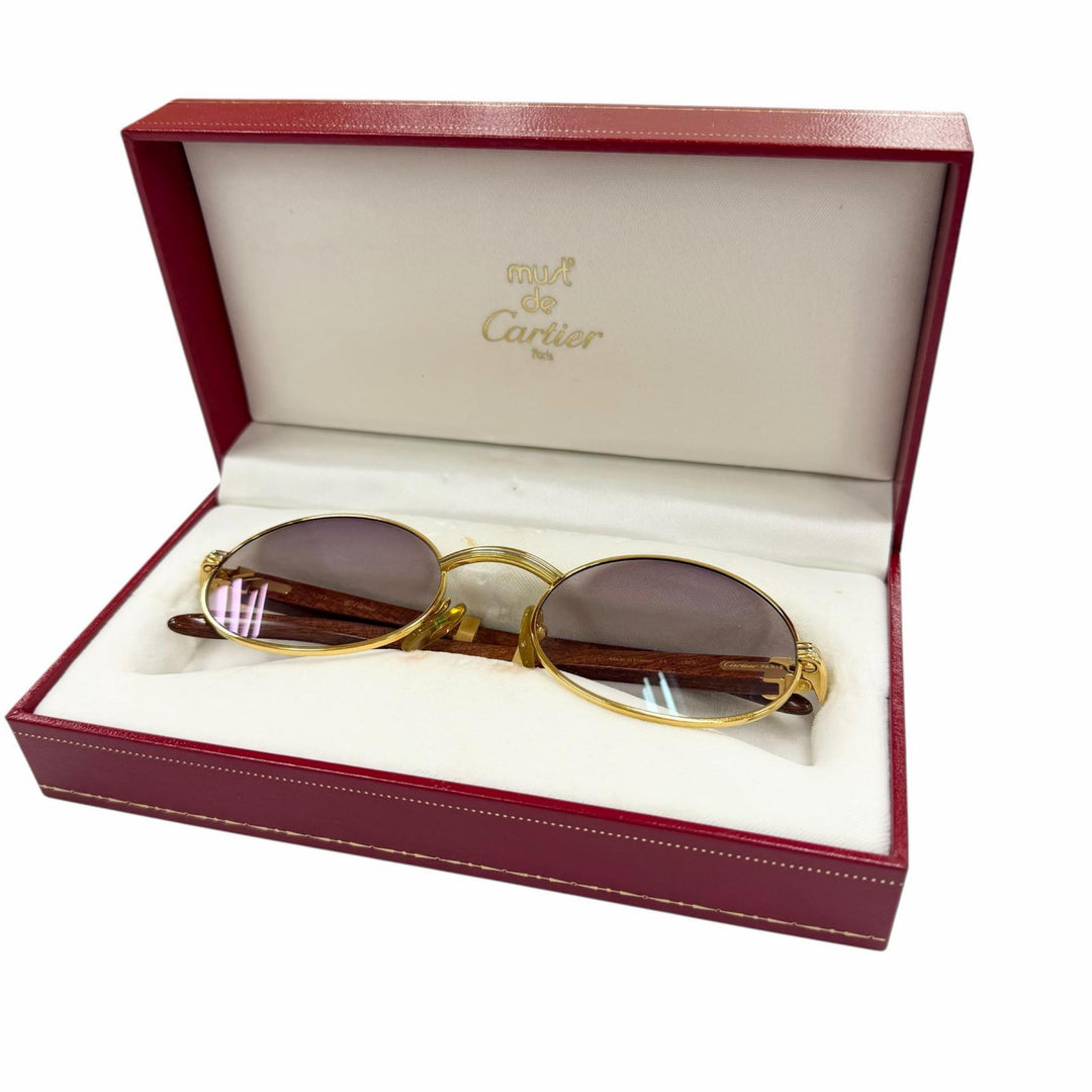 Very Good Cartier sunglasses Trinity gold Wood mens