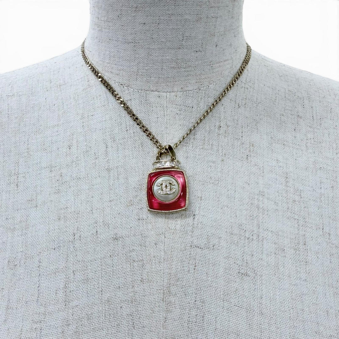 Excellent CHANEL Necklace COCO Mark Rhinestone Perfume Motif Pendant gold A22C