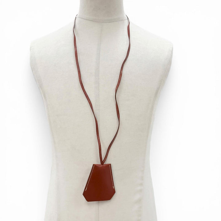 Great HERMES Necklace Margiela-era Clochette Brown leather mens