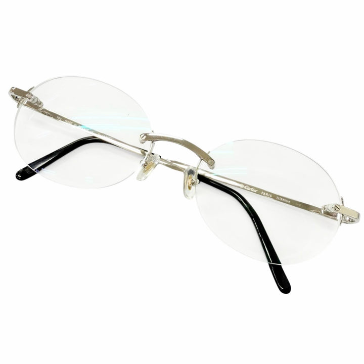 Great Cartier Glasses Santos de Cartier Rimless Oval Silver mens