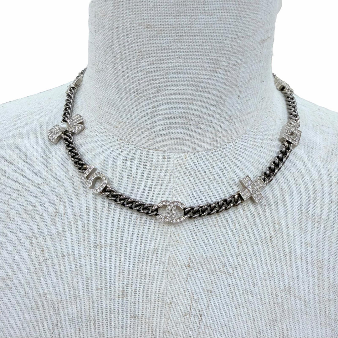 Great CHANEL Necklace COCO Mark 7 Icon Motif Rhinestone Cancer metallic A22P