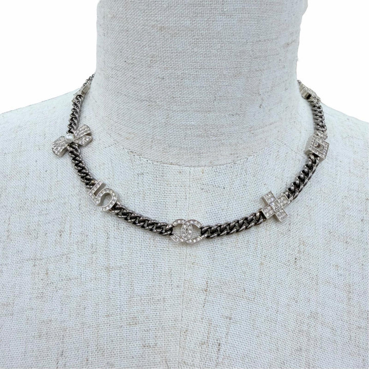 Great CHANEL Necklace COCO Mark 7 Icon Motif Rhinestone Cancer metallic A22P