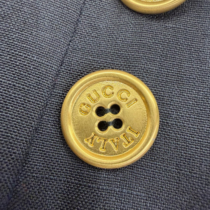 Great GUCCI Wrap skirt Tom Ford era, with logo buttons and belt. black silk 38