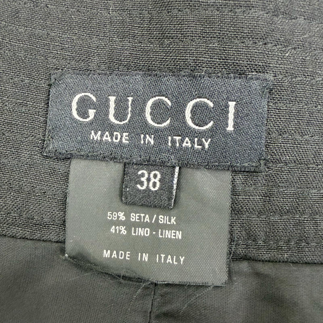 Great GUCCI Wrap skirt Tom Ford era, with logo buttons and belt. black silk 38