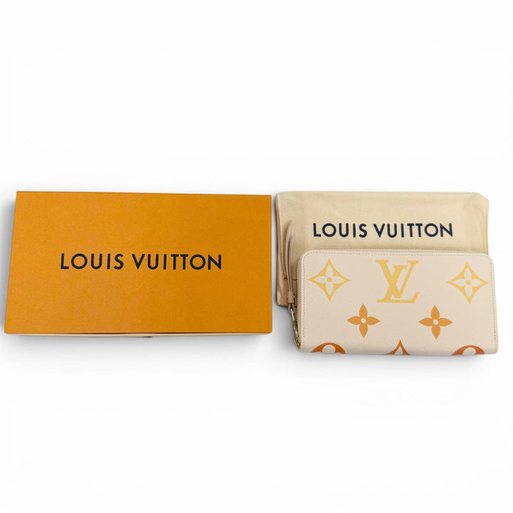 Pristine LOUIS VUITTON LV Gradient Empreinte Zip Around Zippy Wallet M82206