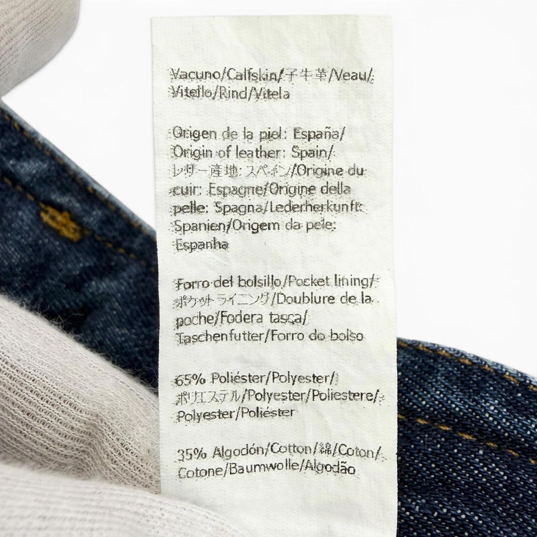 Excellent LOEWE Denim pants ASYMMETRIC JE DENIM Logo leather patch 46 H526Y11X59