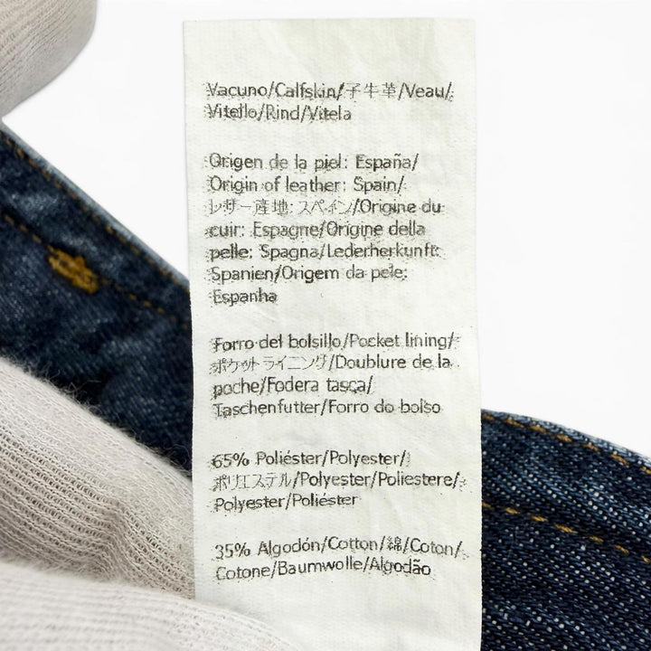 Excellent LOEWE Denim pants ASYMMETRIC JE DENIM Logo leather patch 46 H526Y11X59