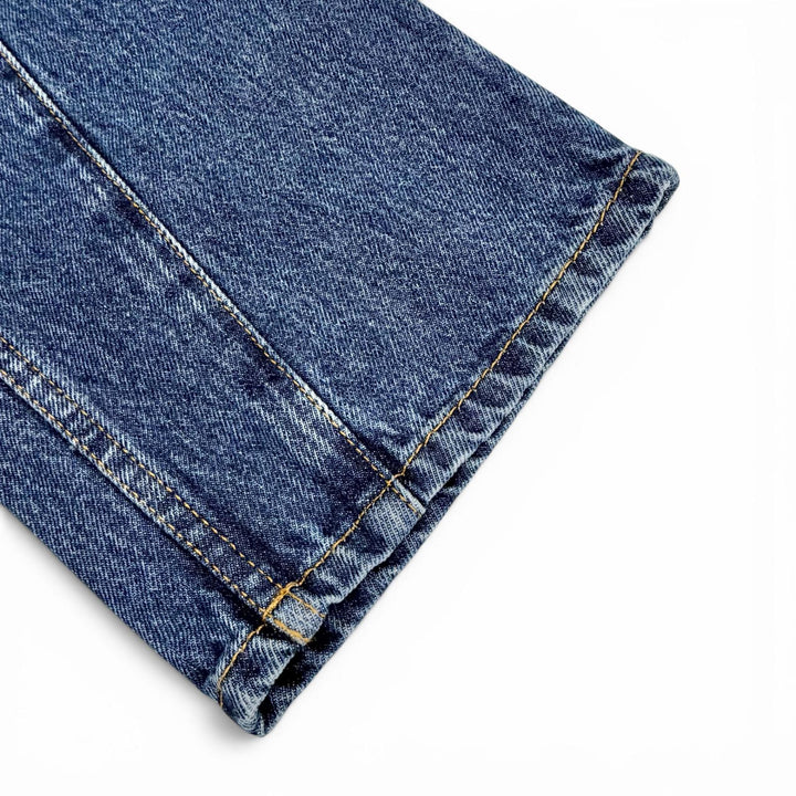 Excellent LOEWE Denim pants ASYMMETRIC JE DENIM Logo leather patch 46 H526Y11X59