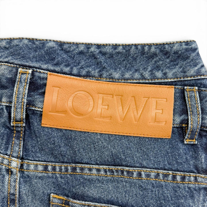 Excellent LOEWE Denim pants ASYMMETRIC JE DENIM Logo leather patch 46 H526Y11X59