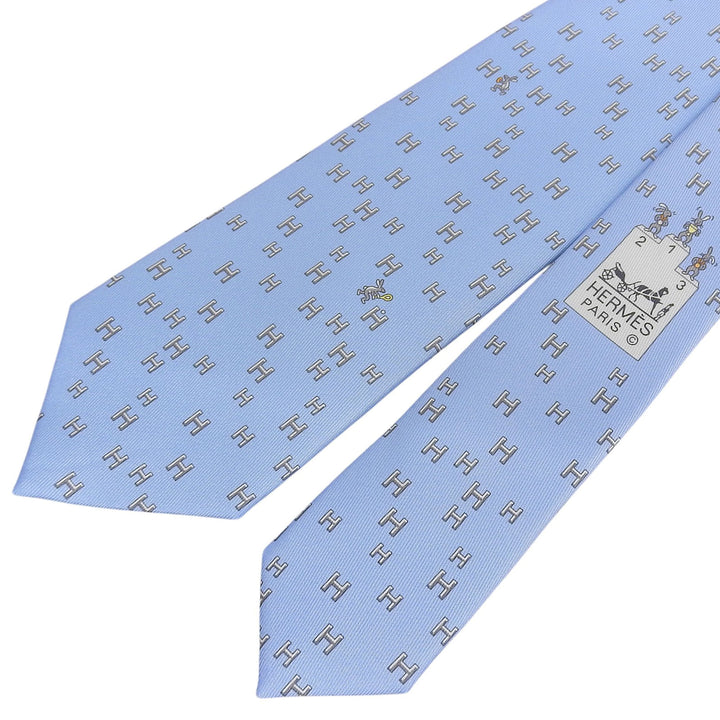 Excellent HERMES tie H-pattern Rabbit Sports Podium Light blue silk mens 6349HA