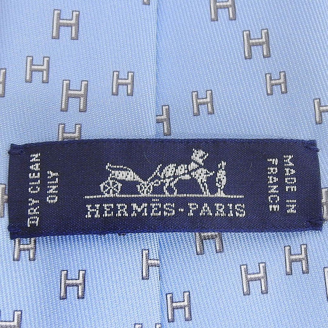 Excellent HERMES tie H-pattern Rabbit Sports Podium Light blue silk mens 6349HA