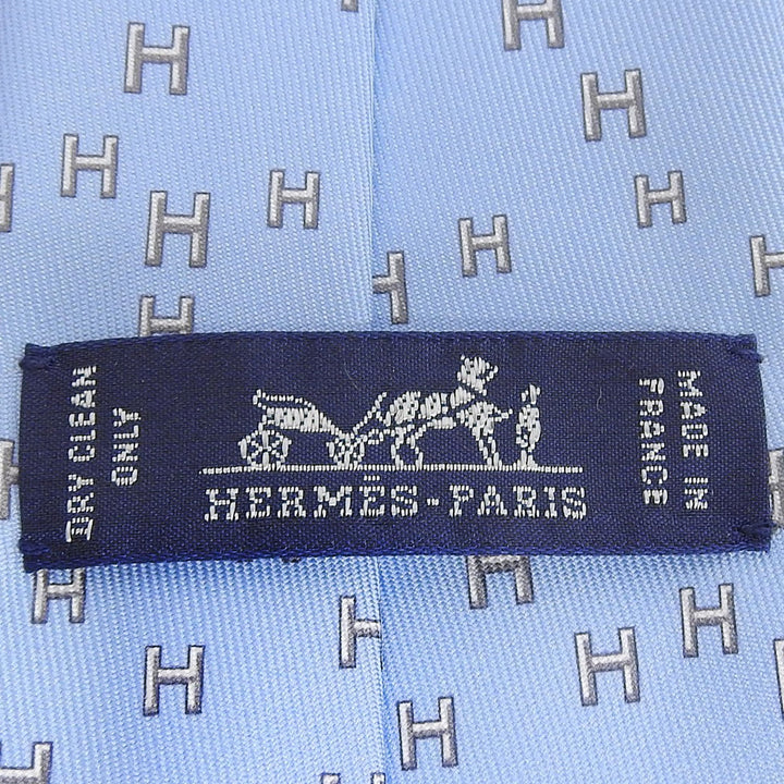 Excellent HERMES tie H-pattern Rabbit Sports Podium Light blue silk mens 6349HA