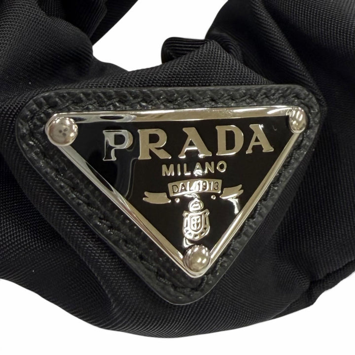 Excellent PRADA Shush Test Triangle with logo RE-NYLON black 1IF015