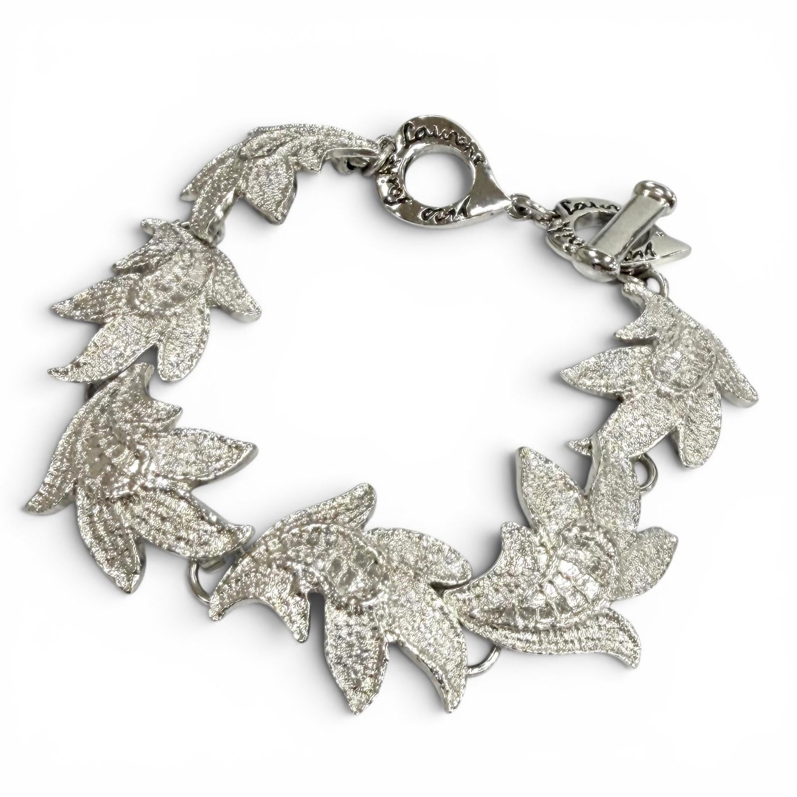Excellent YVES SAINT LAURENT bracelet Rhodium-plated heart toggle