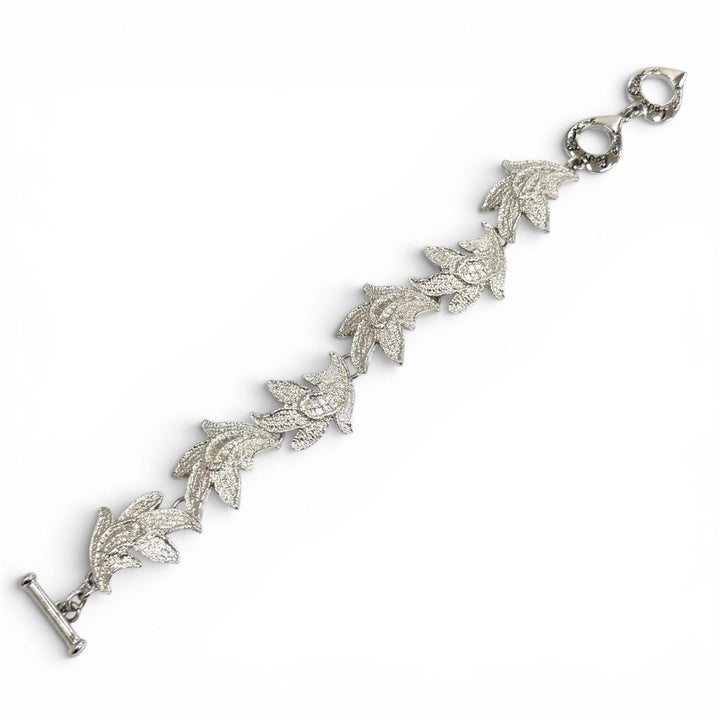 Excellent YVES SAINT LAURENT bracelet Rhodium-plated heart toggle Silver