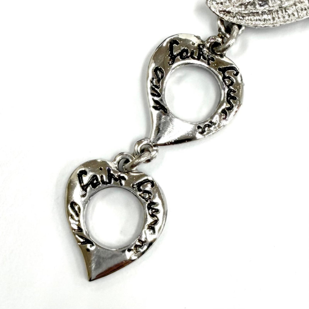 Excellent YVES SAINT LAURENT bracelet Rhodium-plated heart toggle Silver