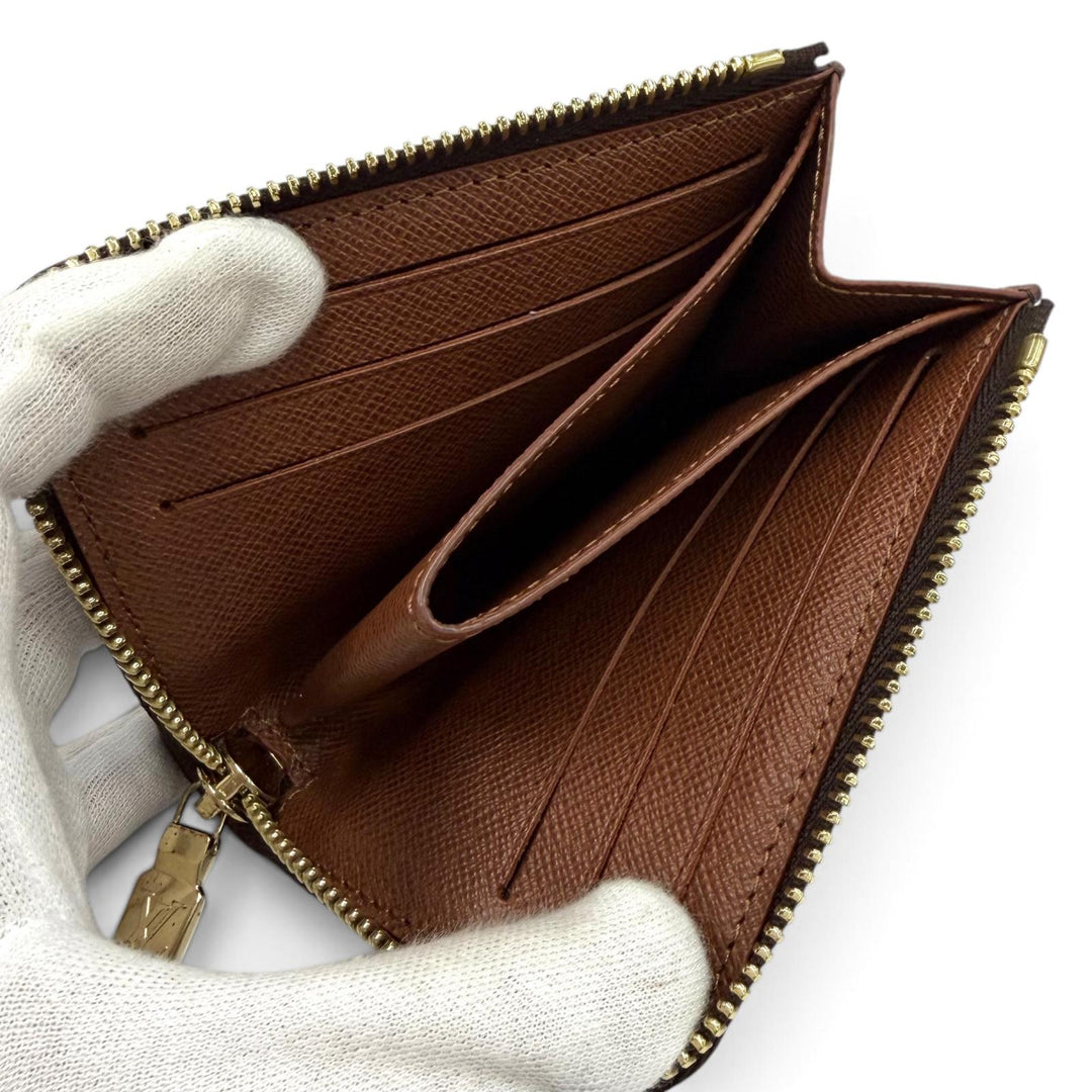Great LOUIS VUITTON Coin case Portefeuille Noah Compact leather leather M83476