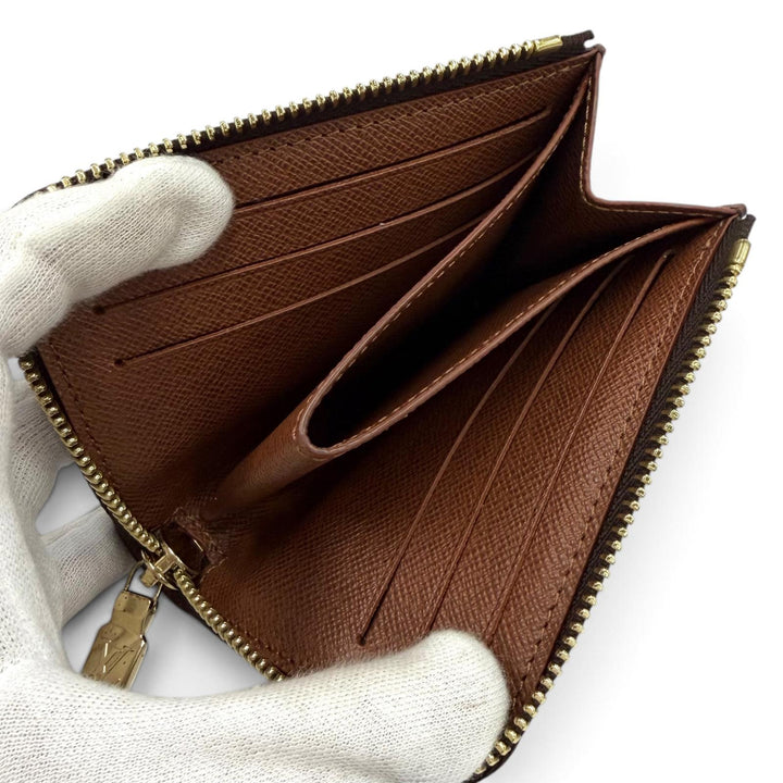 Great LOUIS VUITTON Coin case Portefeuille Noah Compact leather leather M83476