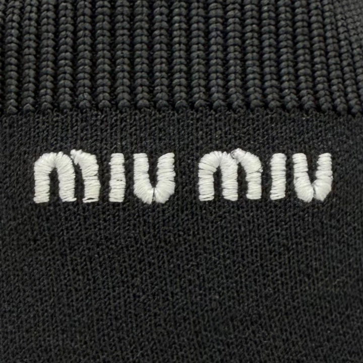 Great MIUMIU sneakers Logo embroidered knit socks, high-top style. 37 5T664C