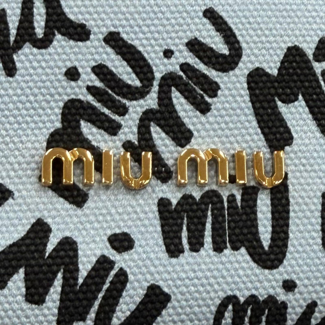 Great MIUMIU Logo print bird motif drawstring bag Light blue cotton 5RM008