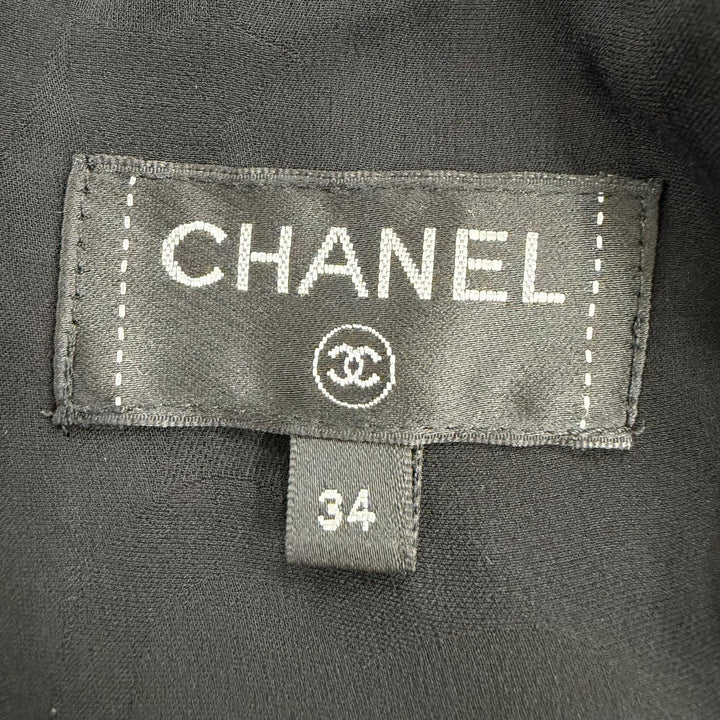 Excellent CHANEL one piece Tweed sleeveless top with silk logo ribbon 34 P60788