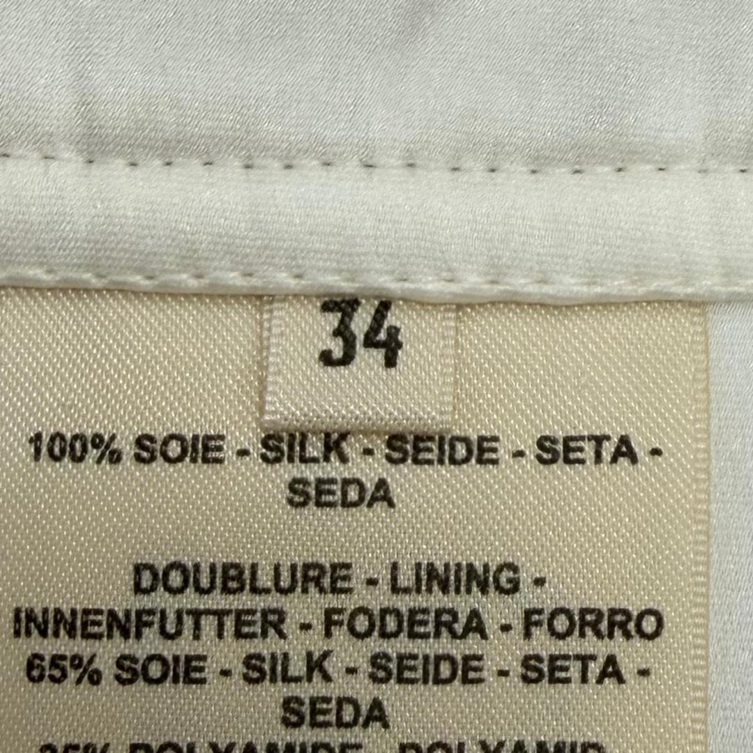 Excellent HERMES Mini skirt JUNGLE LOVE Sellier Button Quilted Trapezoid silk 34