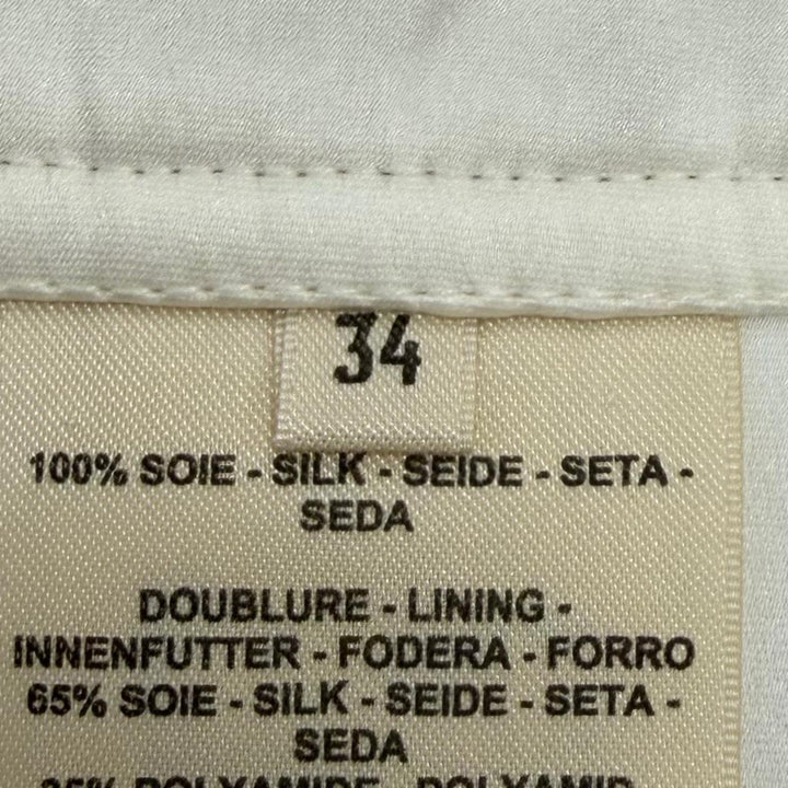 Excellent HERMES Mini skirt JUNGLE LOVE Sellier Button Quilted Trapezoid silk 34