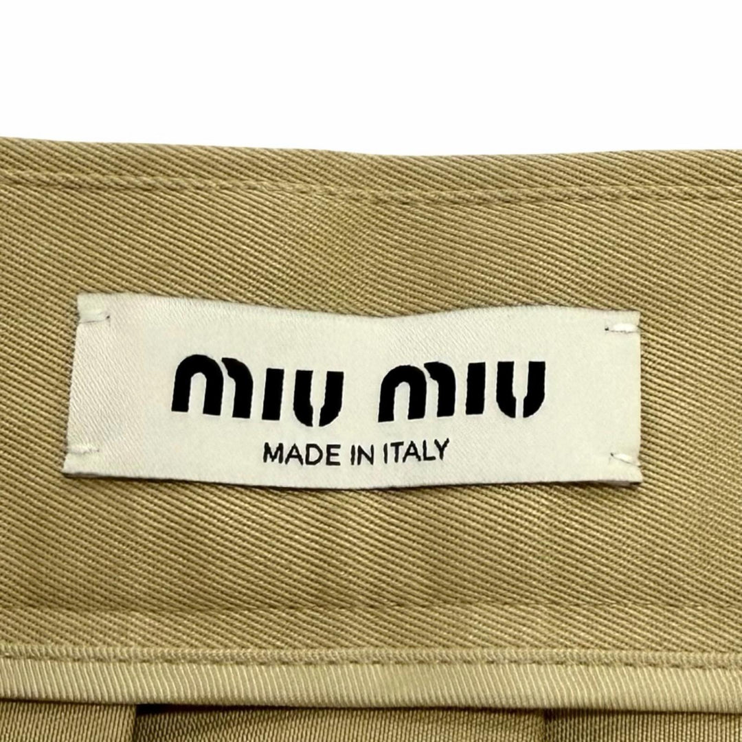 Great Miu Miu Pleated skirt West logo cut-off chinos beige cotton 40 MG1781