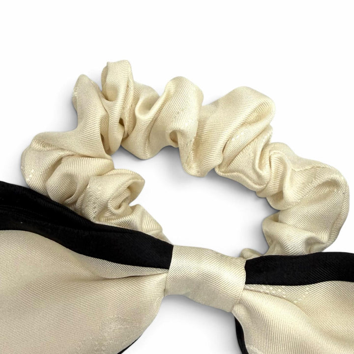 Excellent CHANEL Shush Logo-emblazoned camellia ribbon Ivory silk Women 21S