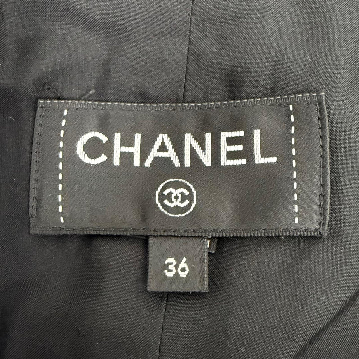 Excellent CHANEL Wrap skirt COCO Mark Lion Button Tweed black P73336V62835 22B