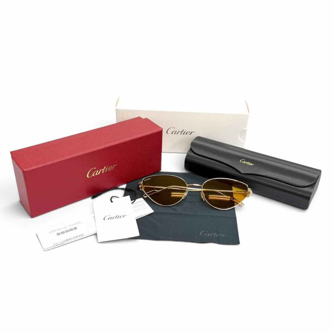 Pristine Cartier sunglasses Première de Cartier 2C Decor Cat's Eye gold CT0155S