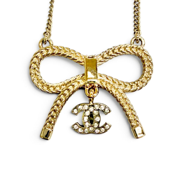 Excellent CHANEL Necklace COCO Mark Rhinestone Ribbon gold Women B24K ABE650