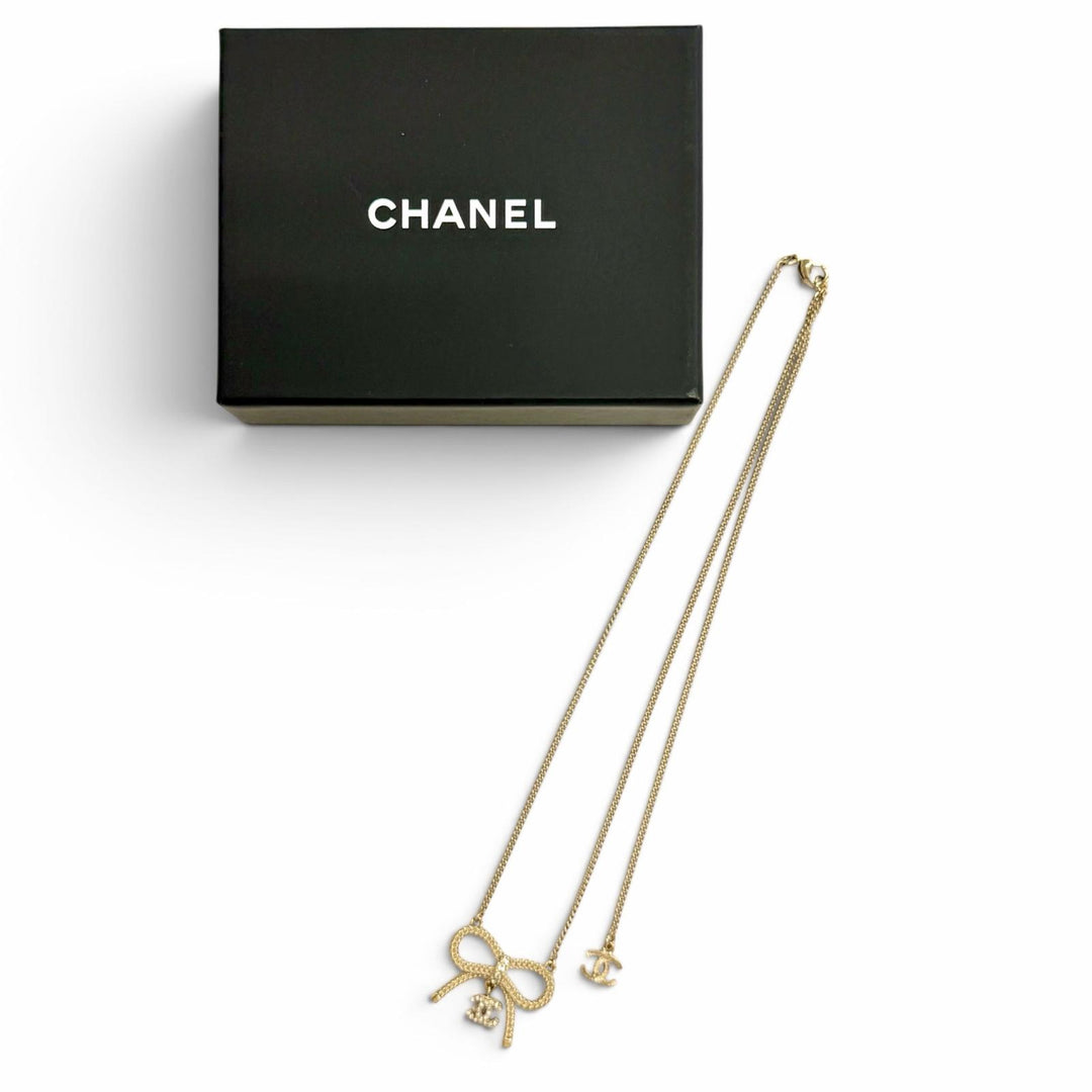 Excellent CHANEL Necklace COCO Mark Rhinestone Ribbon gold Women B24K ABE650